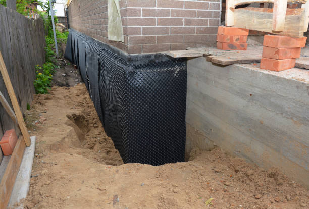 Happy homeowners after waterproofing job in West Elkton